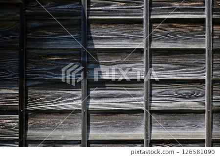 Board wall of an old Japanese house Board wall of an old Japanese house 126581090