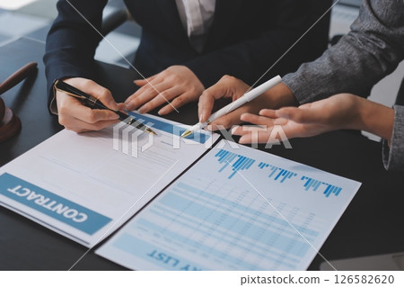 Judge gavel with Justice lawyers having team meeting at law firm background. Concepts of Law and Legal services. Judge gavel with Justice lawyers having team meeting at law firm background. Concepts of Law and Legal services. 126582620