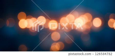Golden dreamy bokeh lights softly scattered on blue background creating peaceful visual glow for elegant festive abstract overlay use 126584782