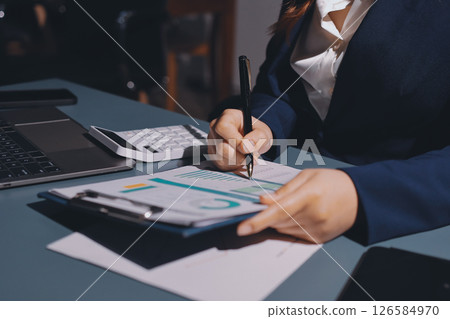 Expert woman asian female people review data number costing managerial account prepare monthly actual cost variance report at tax audit office. ESG sheet budget control ERP process service project. Expert woman asian female people review data number costing managerial account prepare monthly actual cost variance report at tax audit office. ESG sheet budget control ERP process service project. 126584970