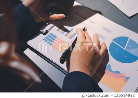 Expert woman asian female people review data number costing managerial account prepare monthly actual cost variance report at tax audit office. ESG sheet budget control ERP process service project. Expert woman asian female people review data number costing managerial account prepare monthly actual cost variance report at tax audit office. ESG sheet budget control ERP process service project. 126584988