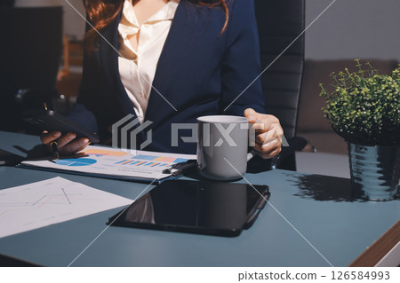 Expert woman asian female people review data number costing managerial account prepare monthly actual cost variance report at tax audit office. ESG sheet budget control ERP process service project. Expert woman asian female people review data number costing managerial account prepare monthly actual cost variance report at tax audit office. ESG sheet budget control ERP process service project. 126584993