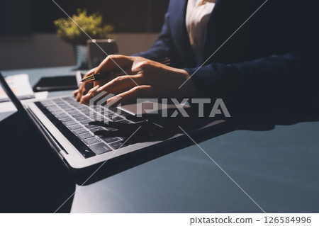Expert woman asian female people review data number costing managerial account prepare monthly actual cost variance report at tax audit office. ESG sheet budget control ERP process service project. 126584996