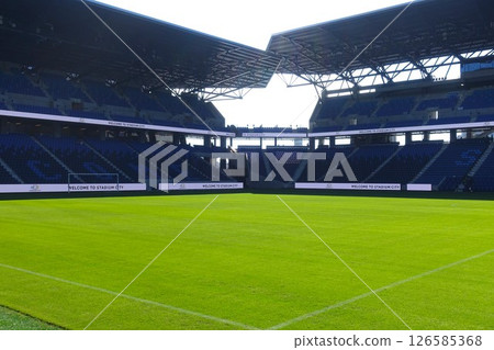 Peace Stadium: A soccer stadium with beautiful grass 126585368