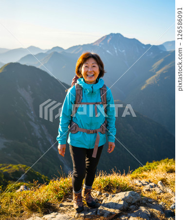 Active senior mountain climbing 126586091