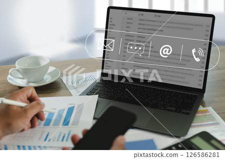 contact us Concept of someone working on a project or writing an email on computer 126586281