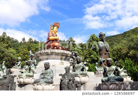Golden Buddha statue at Beomeosa Temple complex, Busan, South Korea. Buddha and Bodhisattva figures in Beomeosa Temple, Busan, Republic of Korea Golden Buddha statue at Beomeosa Temple complex, Busan, South Korea. Buddha and Bodhisattva figures in Beomeosa Temple, Busan, Republic of Korea 126586697