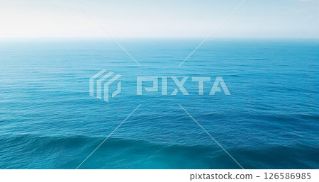 Water background texture. Sea surface. Light wavy sea water. Sea water texture. Turquoise ocean view. 126586985
