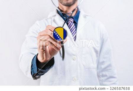 Bosnia healthcare system, doctor holding stethoscope. Bosnia health and medical insurance concept 126587638