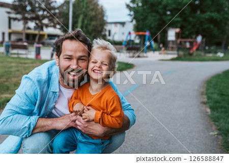 Portrait of dad and child enjoying time together Portrait of dad and child enjoying time together 126588847