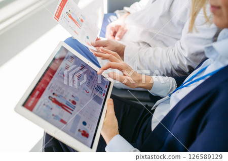 Business interaction between pharma rep and healthcare provider. Business interaction between pharma rep and healthcare provider. 126589129