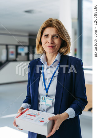 Portrait of female medical sales representative. Portrait of female medical sales representative. 126589166