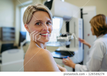 Portrait of female patient before breast cancer screening. Portrait of female patient before breast cancer screening. 126589274