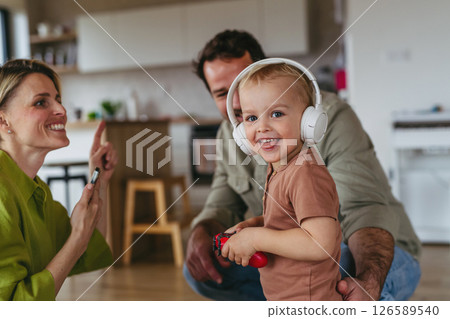 Family bonding moment with young children. 126589540
