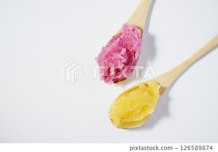 Raspberry and melon fruit scrub texture. Bright pink and yellow body care sugar scrub with exfoliating crystals. Organic cosmetic body care peeling. Natural skincare exfoliating scrubber treatment. 126589874
