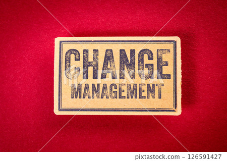 Change Management. Text on Vintage Cardboard Label. Red Background Change Management. Text on Vintage Cardboard Label. Red Background 126591427
