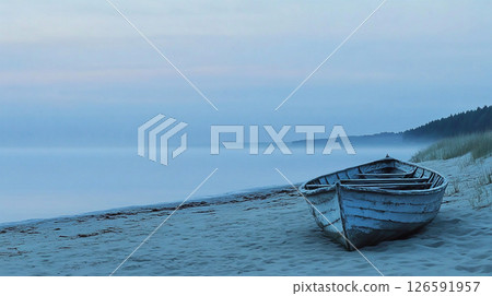 Abandoned boat on a misty beach at dawn 126591957