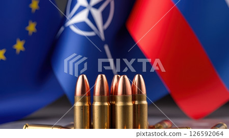 A powerful visual juxtaposes national flags against a backdrop of ammunition symbolizing conflict and military preparedness in a tense geopolitical landscape. A powerful visual juxtaposes national flags against a backdrop of ammunition symbolizing conflict and military preparedness in a tense geopolitical landscape. 126592064