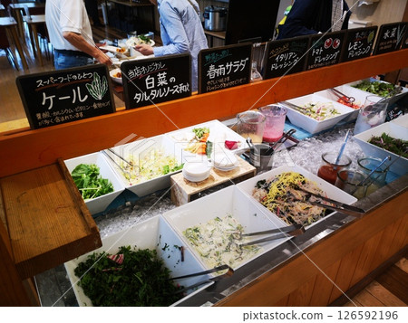 A salad buffet run by a farmer at the roadside station 126592196
