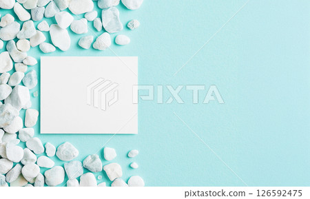 White blank Greeting card mockup on turquoise blue background White blank Greeting card mockup on turquoise blue background 126592475