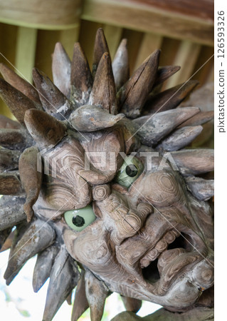 Wooden Oni demon head statue at Mitaki-Dera temple in Hiroshima, Japan 126593326