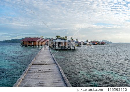 Wooden jetty to Bajo village, Pulau Papan, Sulawesi, Indonesia 126593350
