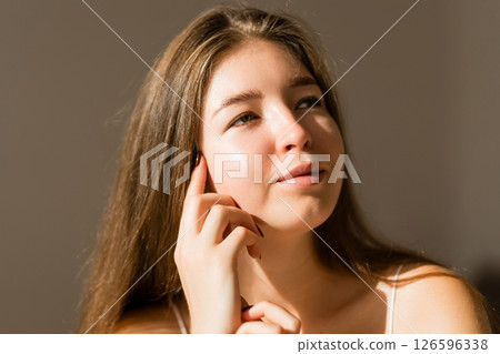 Portrait of beautiful woman without makeup with imperfect skin. Acne skin. Pores on skin of face. 126596338