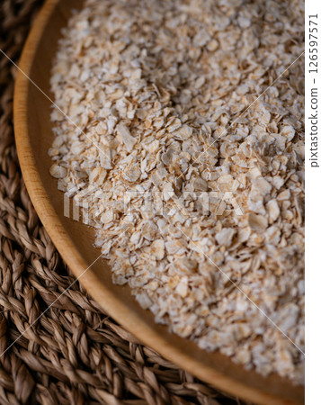 organic Instant Oatmeal or oat flakes pattern background. organic Instant Oatmeal or oat flakes pattern background. 126597571