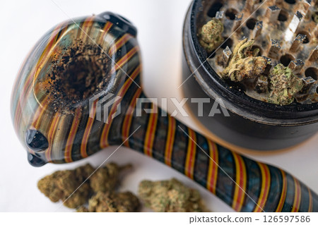 Marijuana Cannabis weed buds with pipe and grinder. 126597586