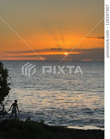 Sunset over the sea 126597907