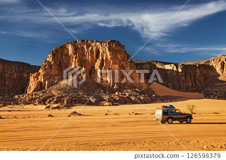 Car drives in Sahara Desert in Algeria 126598379