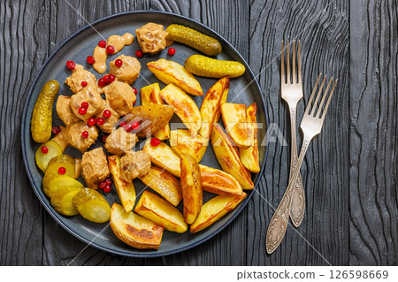 meatballs, potatoes, pickles, berries on a plate meatballs, potatoes, pickles, berries on a plate 126598669