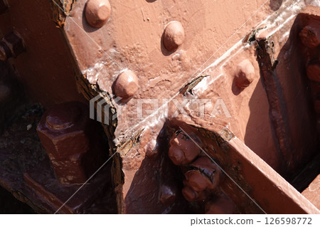 Old Amarube Bridge: Corroded steel members, rivets, and bolts in the bridge pier 126598772