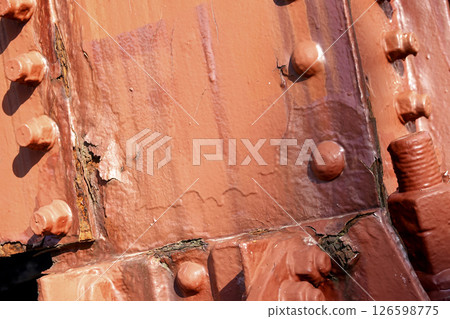 Old Amarube Bridge: Corroded steel members, rivets, and bolts in the pier 126598775