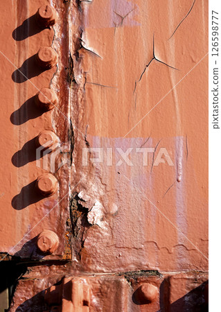Old Amarube Bridge: Corroded steel members, rivets, and bolts in the pier 126598777