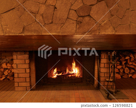 Burning fire in the hotel lobby 126598821