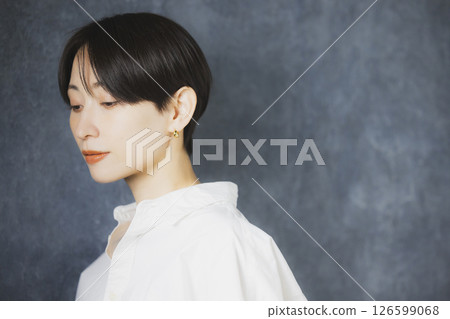 A woman with a white shirt A woman with a white shirt 126599068