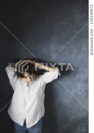 A woman with a white shirt A woman with a white shirt 126599072