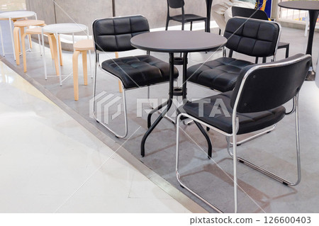 Chair and round table good for Home and Office Interiors. 126600403