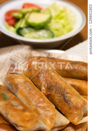 Freshly baked spring rolls (vertical) 126601803