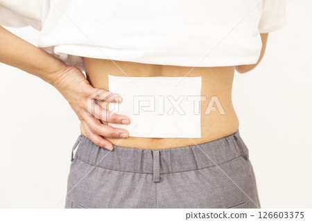 Woman's waist with a compress 126603375