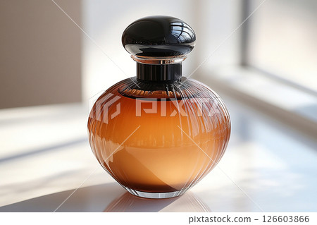 Perfume bottle with glossy on its glass surface, conveying elegance and sophistication. Ideal for high-end perfume advertisements. Perfume bottle with glossy on its glass surface, conveying elegance and sophistication. Ideal for high-end perfume advertisements. 126603866