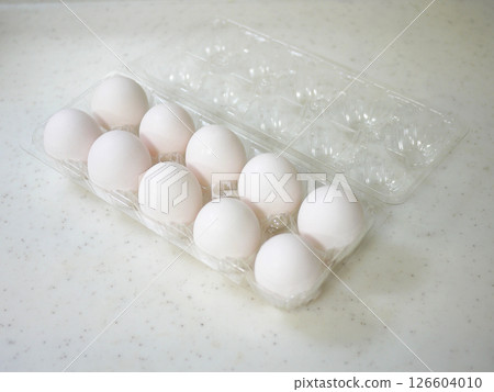 Aerial view of fresh egg carton containing 10 shiratama eggs Aerial view of fresh egg carton containing 10 shiratama eggs 126604010