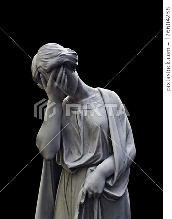 Carved stone cemetery statue of a woman expressing grief isolated on black background Carved stone cemetery statue of a woman expressing grief isolated on black background 126604238