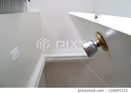 White interior door with round metal handle 126605152