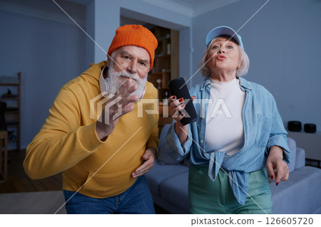 Elderly couple wearing trendy fashion outfit with youth clothing style 126605720