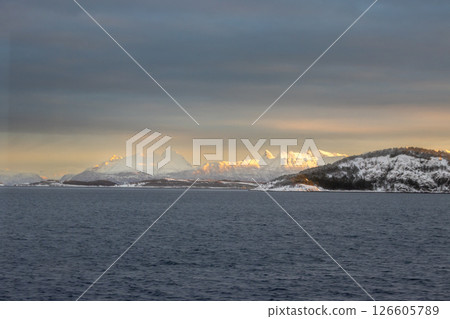 Sea and mountains in the sunrise, Norway 126605789