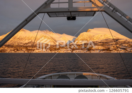 Detail of a boat in the sunrise, Norway 126605791