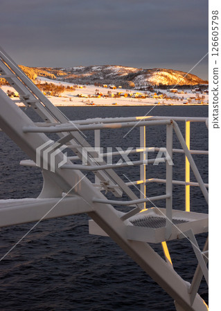 Detail of a boat in the sunrise, Norway 126605798