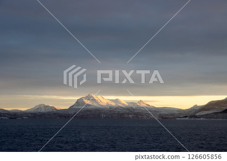 Sea and mountains in the sunrise, Norway 126605856